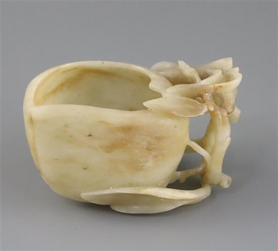 A Chinese jade peach cup, probably 17th / 18th century, L.11.5cm